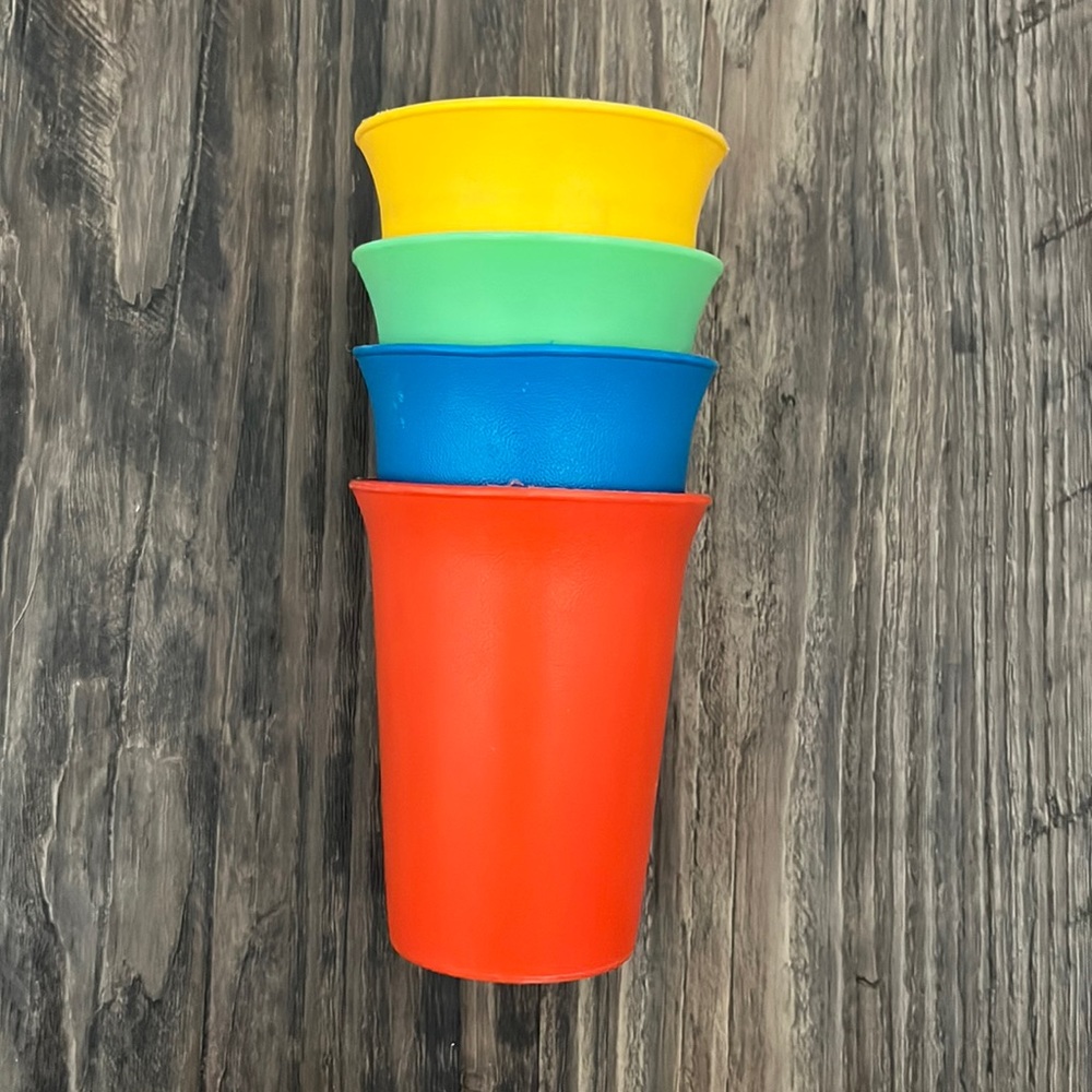 Vintage Tupperware cup set. Four cups. Yellow, green, blue and red.